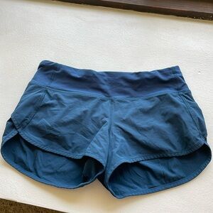 Navy blue lululemon speed up shorts. Size 4, low rise, 2.5 inch inseam.